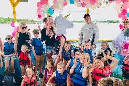 a group of people posing for a photo