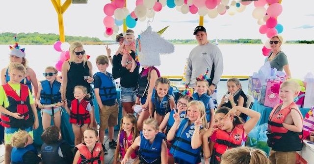 a group of people posing for a photo