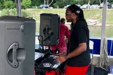a man standing in front of a computer