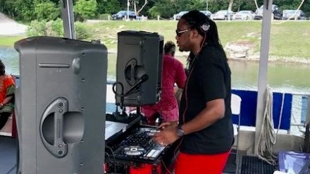 a man standing in front of a computer