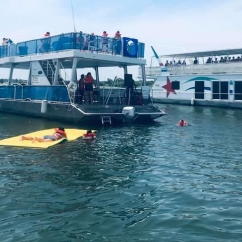 a small boat in a large body of water