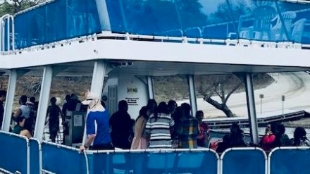 a group of people on a boat