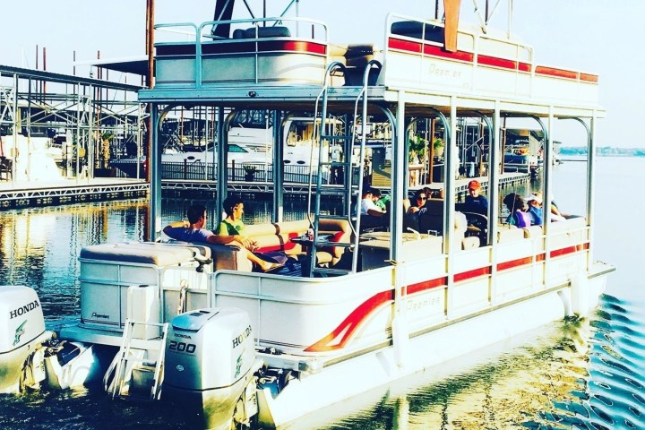 a boat is docked next to a body of water