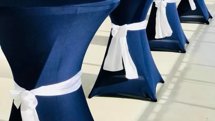 a statue of a blue vase on a table