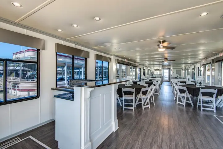 a room filled with furniture and a large window