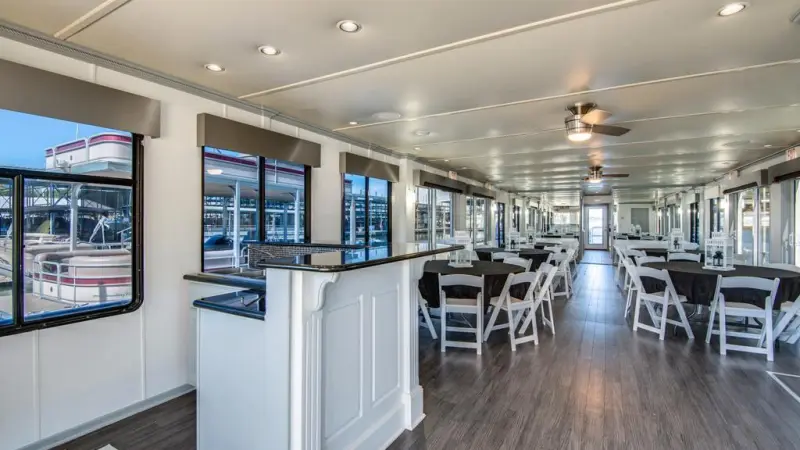 a room filled with furniture and a large window