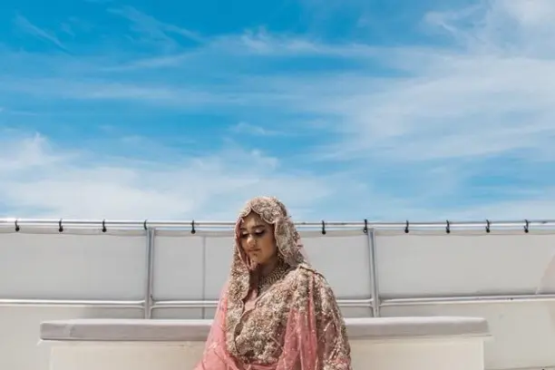 a person sitting on a bed