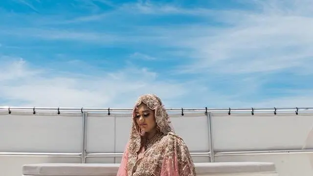 a person sitting on a bed