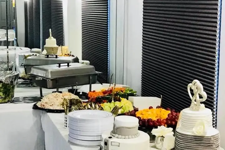 a group of people sitting at a table with wine glasses