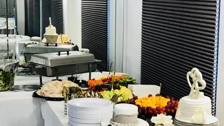 a group of people sitting at a table with wine glasses