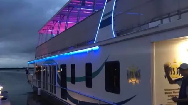 a group of people sitting at a train station
