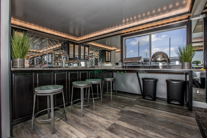 a room filled with furniture and a large window