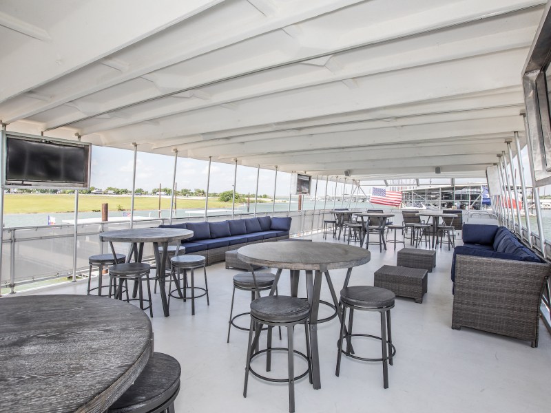 a large room with tables and chairs