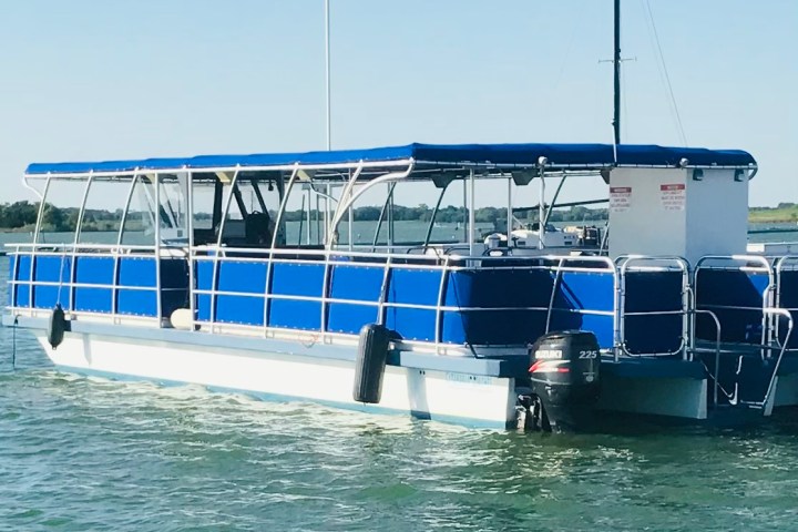 a small boat in a large body of water