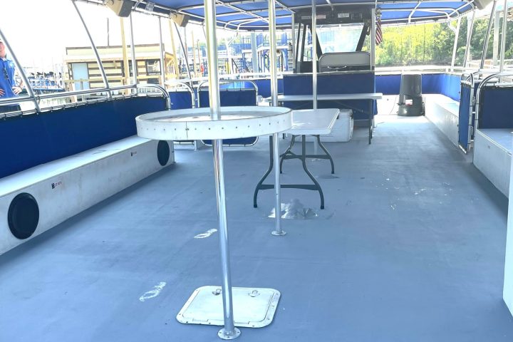 a boat sitting on top of a building