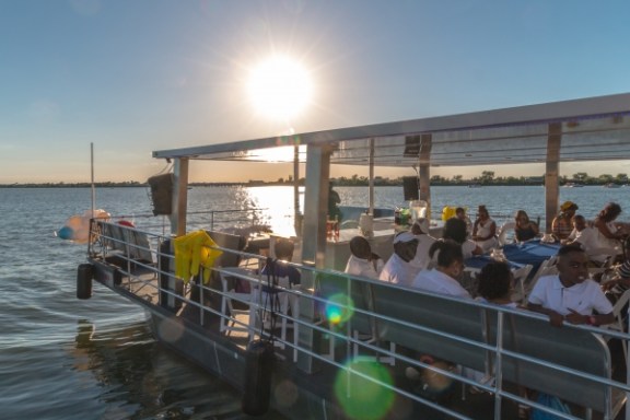 a group of people on a pier