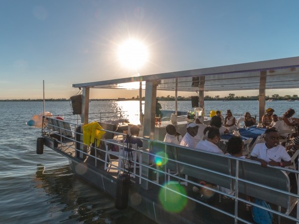 a group of people on a pier