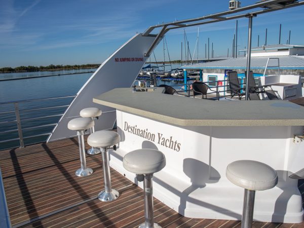 a chair next to a body of water