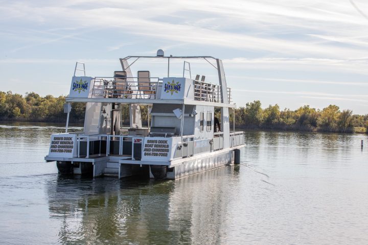 a boat is docked next to a body of water