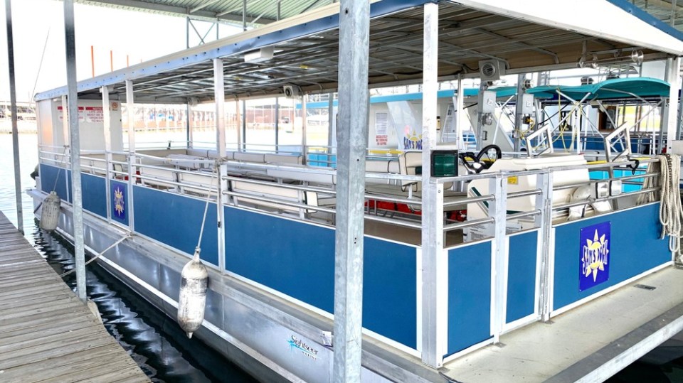 a passenger train pulling into a station