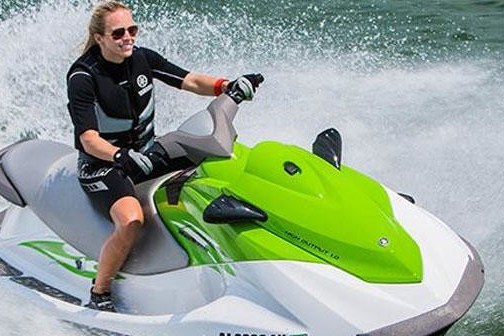 a man riding a wave on a surfboard in the water