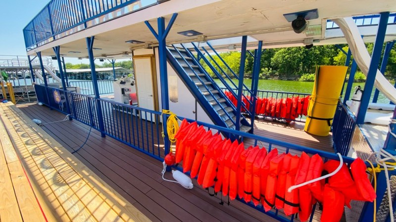 a group of people sitting at a train station