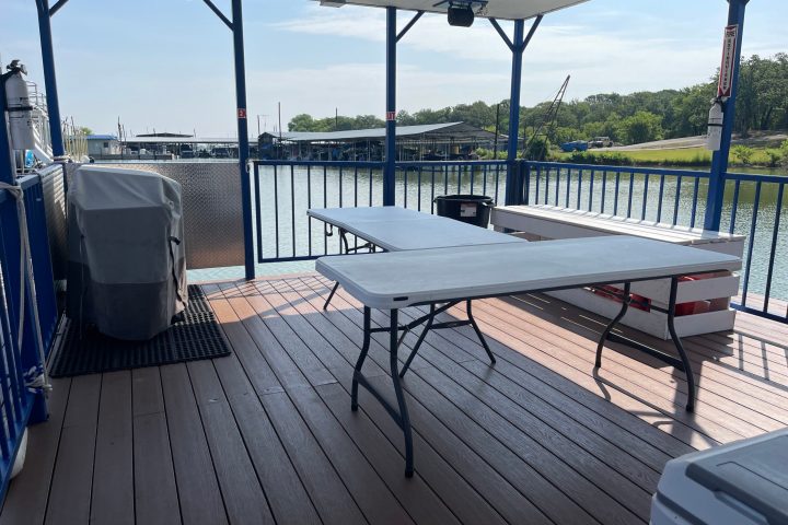 a bench next to a body of water