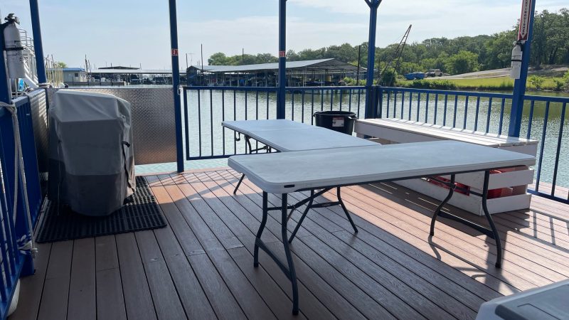 a bench next to a body of water